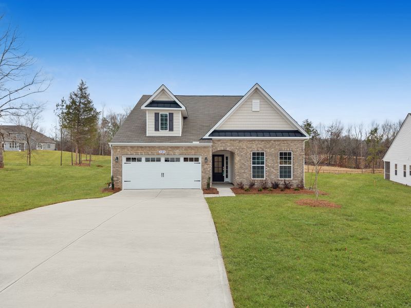 Front exterior of a new home in Arrowood Acres, Enoree, SC, highlighting curb appeal (Image 1).
