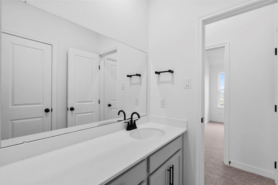 This secondary bath combines practical layout with bold, contemporary style. This secondary bath combines practical layout with bold, contemporary style.