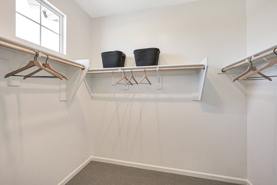 A room with a table chairs and a chair.