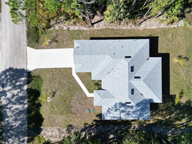 Front exterior of a new home in , Palm Bay, FL, highlighting curb appeal (Image 18).