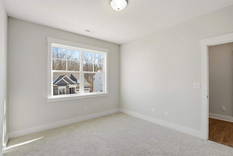 Spacious, unfurnished interior of a new home in Rone Creek, Waxhaw (Image 64).