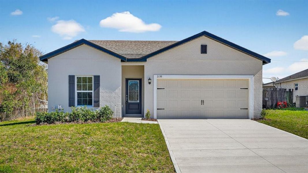 Front exterior of a new home in , Deltona, FL, highlighting curb appeal (Image 2). Front exterior of a new home in , Deltona, FL, highlighting curb appeal (Image 2).