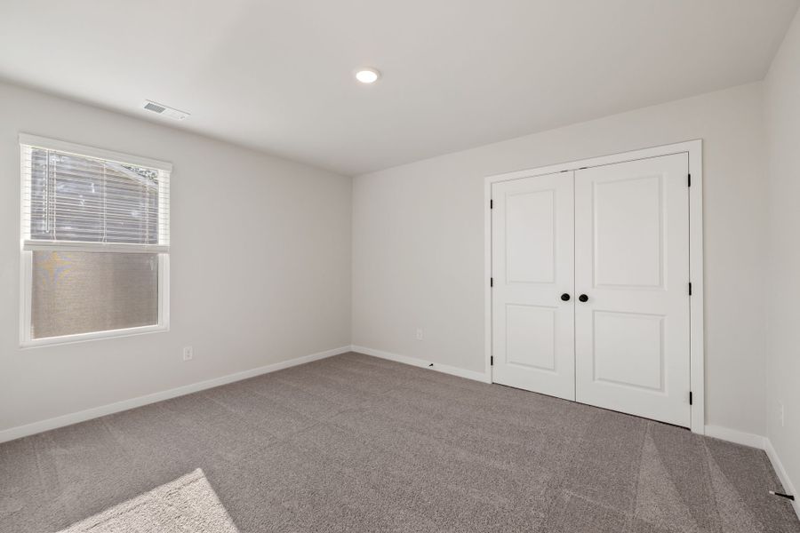 A room with white doors.