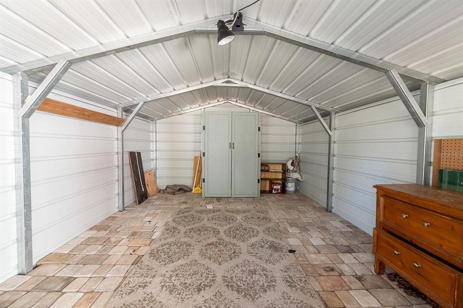 Exterior details and patio area of a home in , Morriston (Image 27).