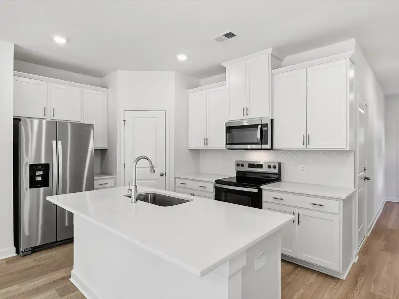 Furnished interior view inside a new home in Courts at Brook Run, Moncks Corner (Image 3).