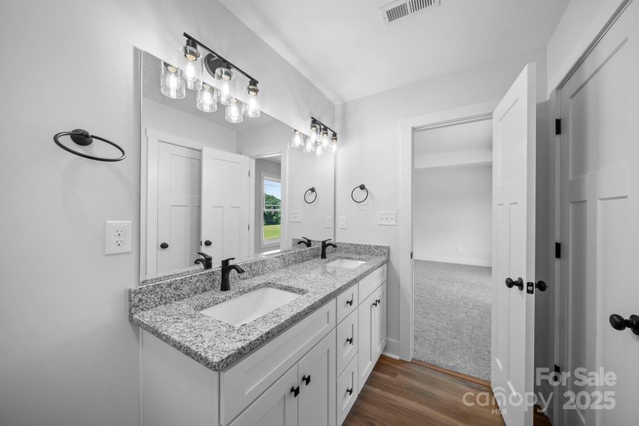 Furnished interior view inside a new home in , Wingate (Image 11).