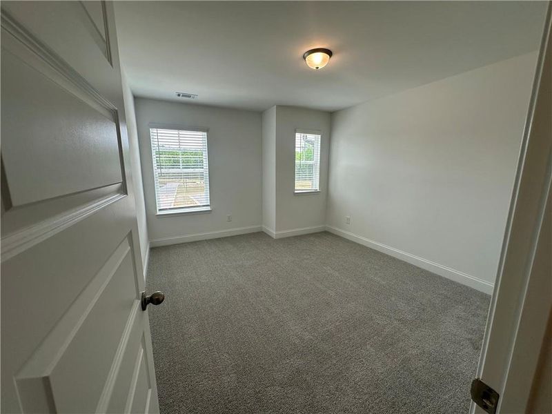 Spacious, unfurnished interior of a new home in Mulberry Summit, Flowery Branch (Image 21).
