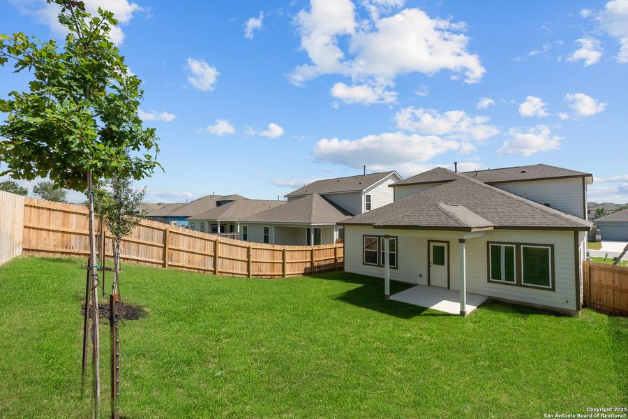 Front exterior of a new home in The Meadows at Hunters Ranch, San Antonio, TX, highlighting curb appeal (Image 18).
