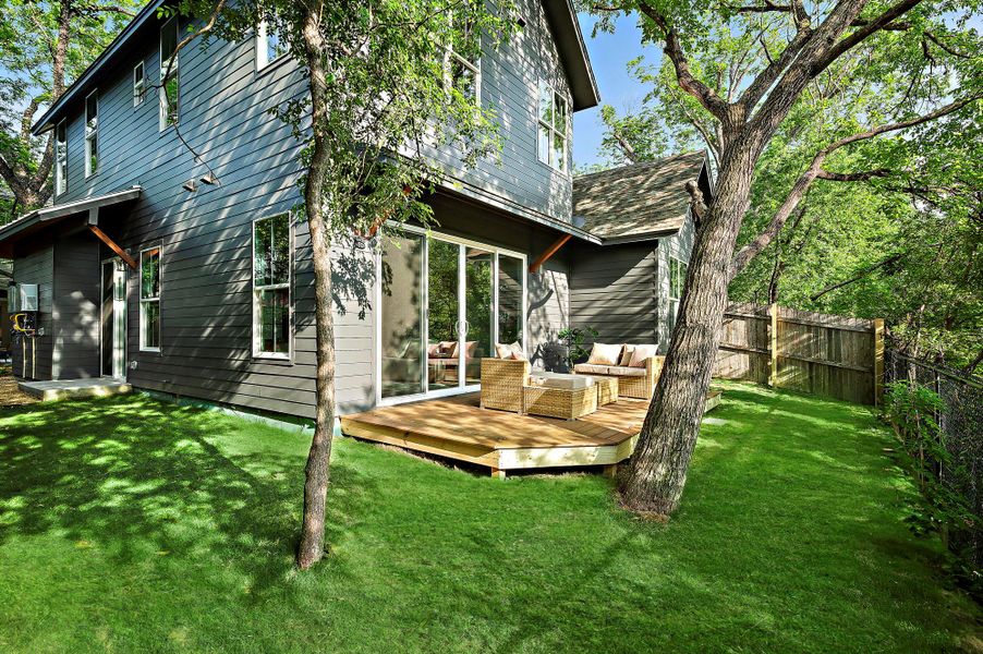 Back of property featuring a deck