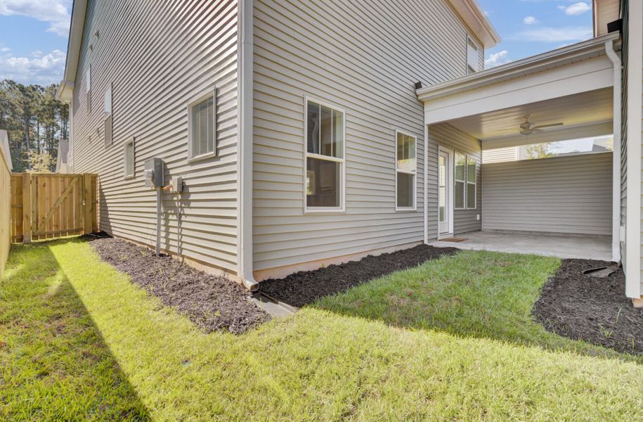 Exterior details and patio area of a home in Six Oaks, Summerville (Image 31).