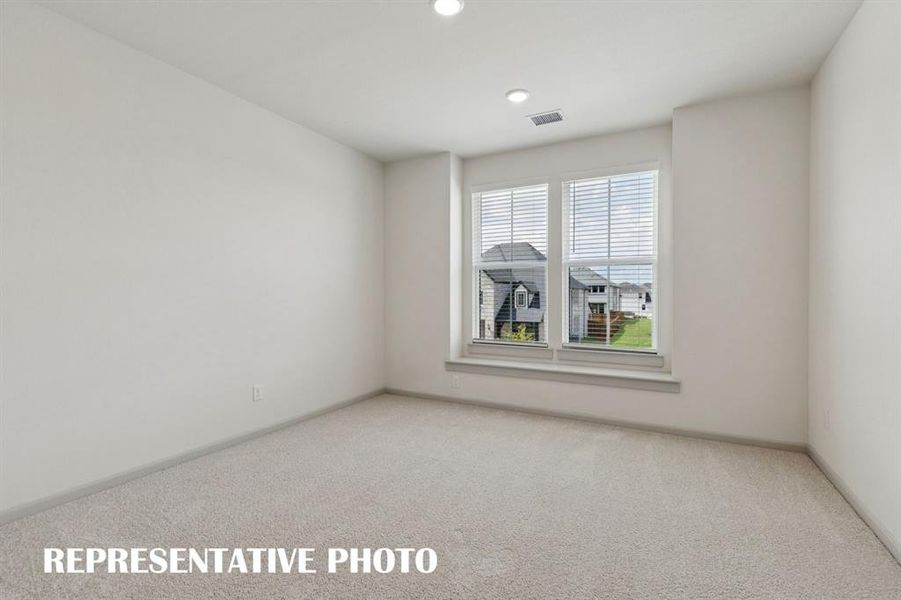 You'll find nicely sized secondary bedrooms in our Rennes plan.  REPRESENTATIVE PHOTO