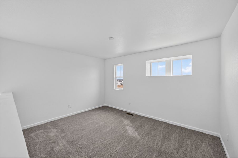 Spacious, unfurnished interior of a new home in The Town Collection at Independence, Elizabeth (Image 14).