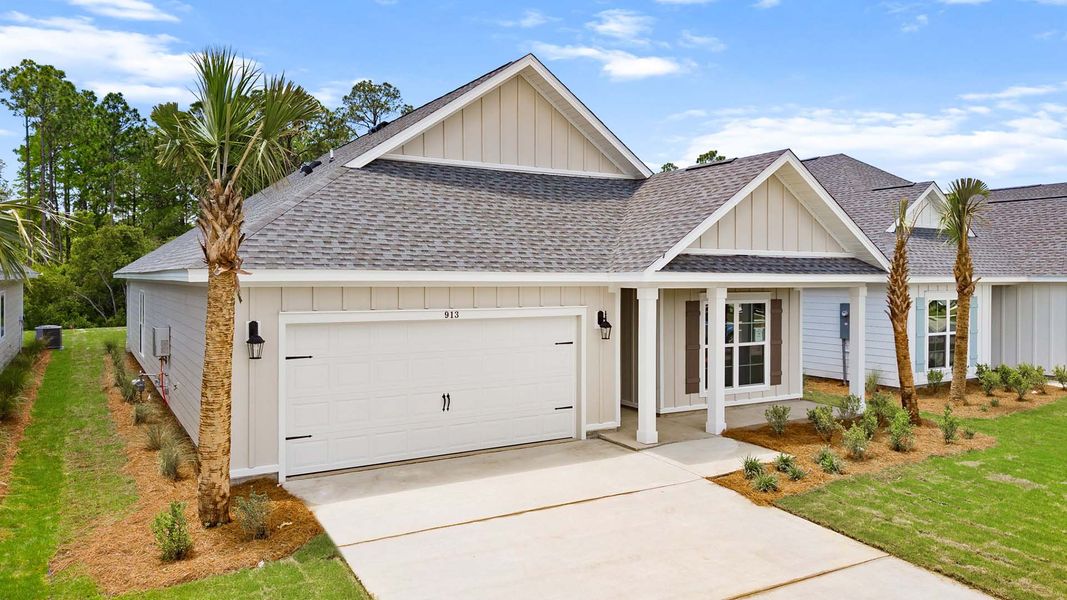 Front exterior of a new home in Breakfast Point East Phase II, Panama City Beach, FL, highlighting curb appeal (Image 2). Front exterior of a new home in Breakfast Point East Phase II, Panama City Beach, FL, highlighting curb appeal (Image 2).
