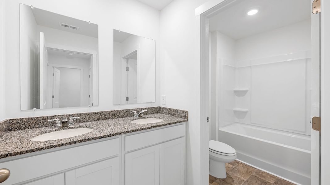 Furnished interior view inside a new home in Evergreen Landing, Rossville (Image 7).