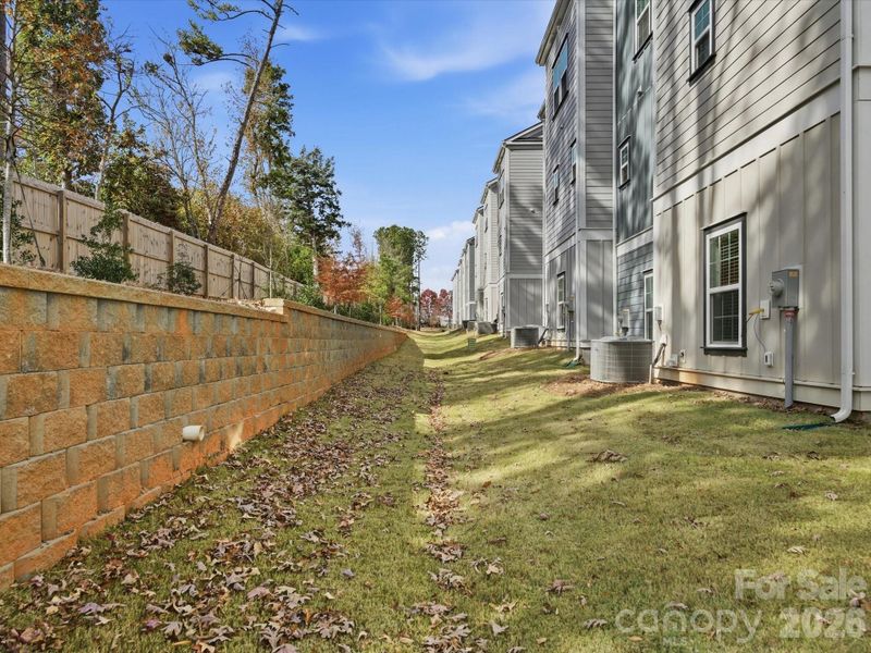 Exterior details and patio area of a home in Sycamore Trail, Matthews (Image 4).