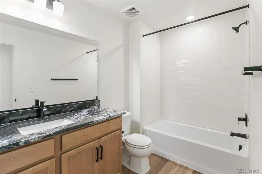 Furnished interior view inside a new home in Turnberry Villas, Commerce City (Image 17).