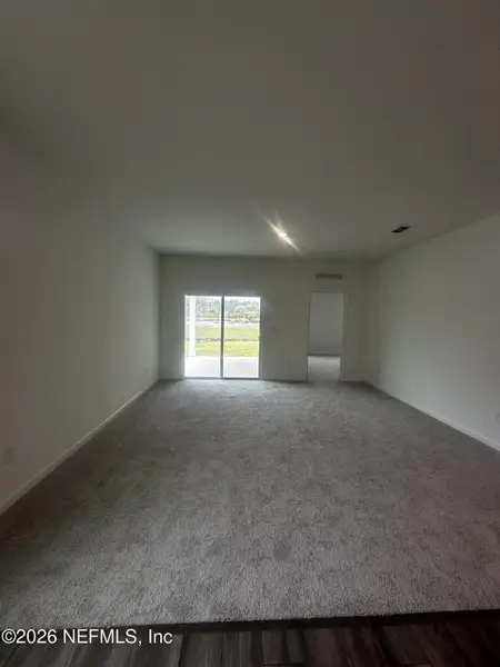 Spacious, unfurnished interior of a new home in , Palm Coast (Image 11).