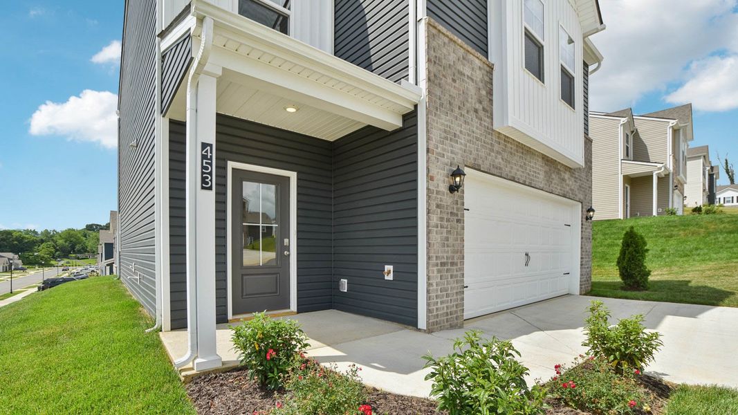 Representative exterior photo of a completed home built from the Craig by D.R. Horton in The Hideaway at Fox Meadows, Bluff City, TN (Image 20).