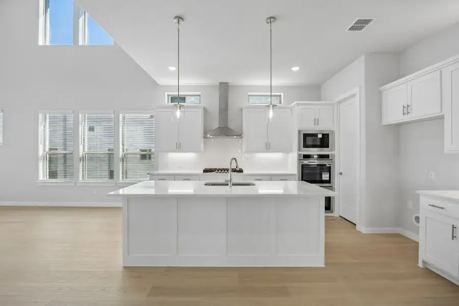Kitchen in the Monet II home plan by Trophy Signature Homes – REPRESENTATIVE PHOTO Kitchen in the Monet II home plan by Trophy Signature Homes – REPRESENTATIVE PHOTO
