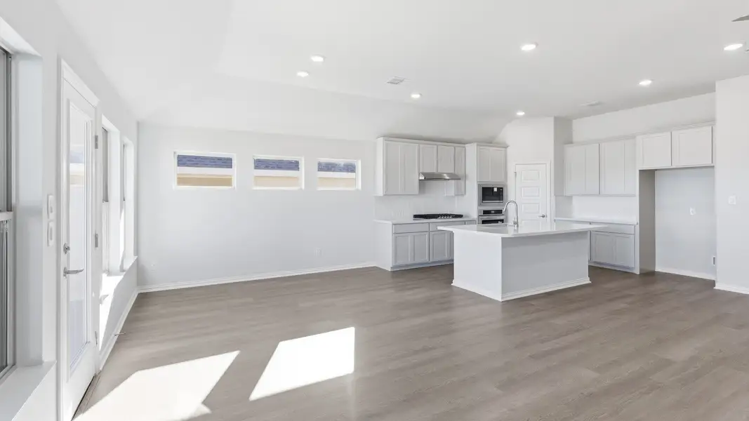 Furnished interior view inside a new home in Carillon, Manor (Image 7).