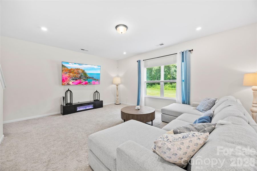 Furnished interior view inside a new home in Orchard Creek, Charlotte (Image 30).