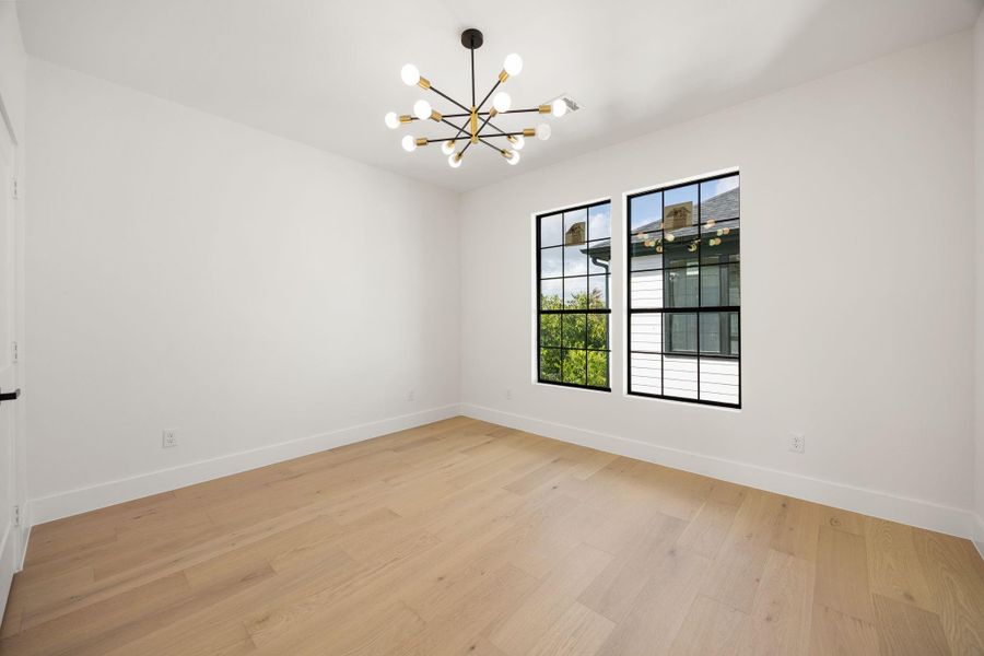 Third level bedroom with natural lighting.