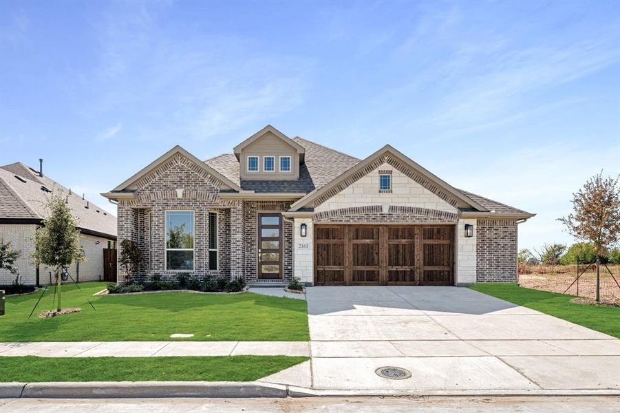 Front exterior of a new home in Stone River Glen 50s, Royse City, TX, highlighting curb appeal (Image 1). Front exterior of a new home in Stone River Glen 50s, Royse City, TX, highlighting curb appeal (Image 1).