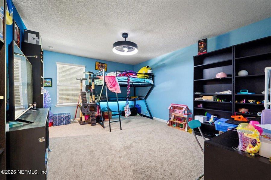 Furnished interior view inside a new home in RiverTown - Settlement, St. Johns (Image 27).