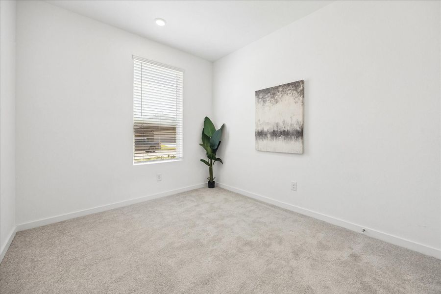 Make this room whatever you need it to be. Plush carpet, neutral paint, a large closet and easy access to a full bath make it equally comfortable as a guest bedroom, home office, workout space or creative studio.