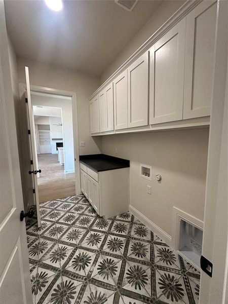 Primary Closet Adjoins Laundry Room Primary Closet Adjoins Laundry Room