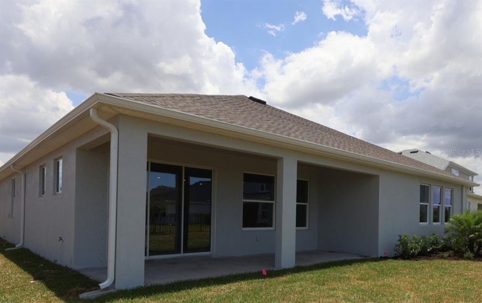 Exterior details and patio area of a home in Coasterra, Palmetto (Image 2). Exterior details and patio area of a home in Coasterra, Palmetto (Image 2).