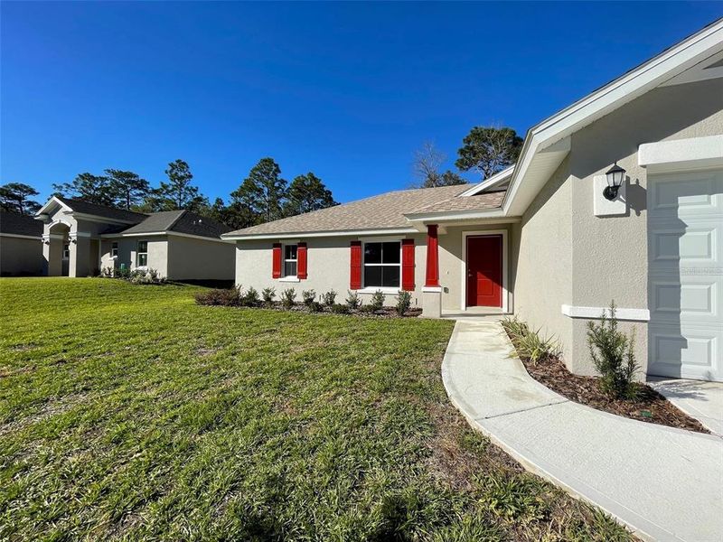 Exterior details and patio area of a home in , Citrus Springs (Image 3).