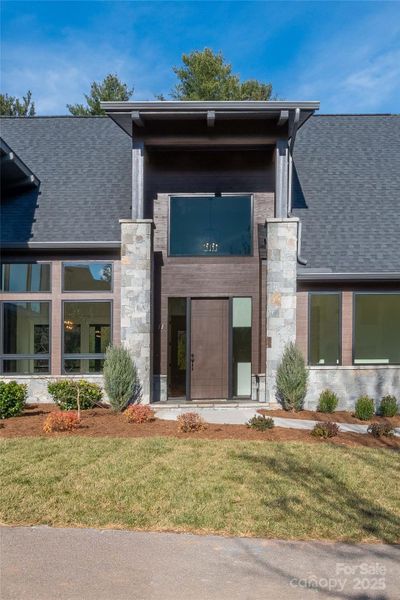 Front exterior of a new home in , Asheville, NC, highlighting curb appeal (Image 19). Front exterior of a new home in , Asheville, NC, highlighting curb appeal (Image 19).