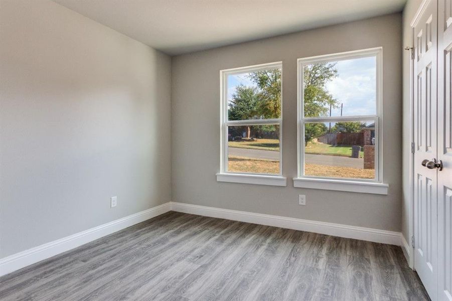 Spare room with light wood finished floors