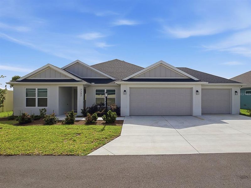 Front exterior of a new home in , The Villages, FL, highlighting curb appeal (Image 24). Front exterior of a new home in , The Villages, FL, highlighting curb appeal (Image 24).