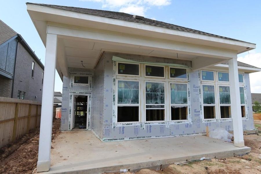 Front exterior of a new home in Harvest Green 45', Richmond, TX, highlighting curb appeal (Image 19).