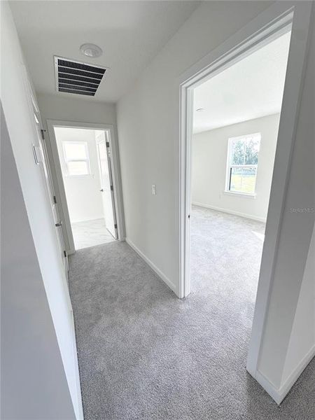 Spacious, unfurnished interior of a new home in Grasslands West, Lakeland (Image 30).