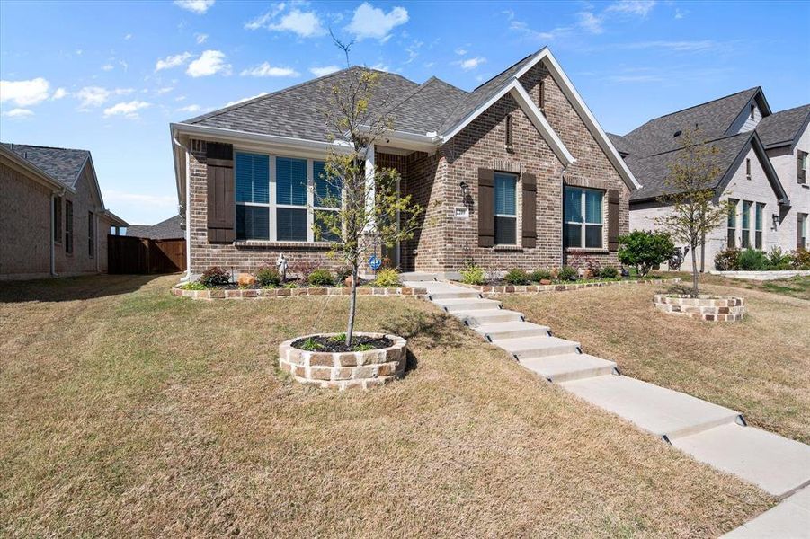 Front exterior of a new home in , Waxahachie, TX, highlighting curb appeal (Image 20).