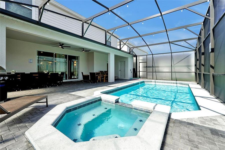 Exterior details and patio area of a home in Windsor Island Resort, Davenport (Image 24).