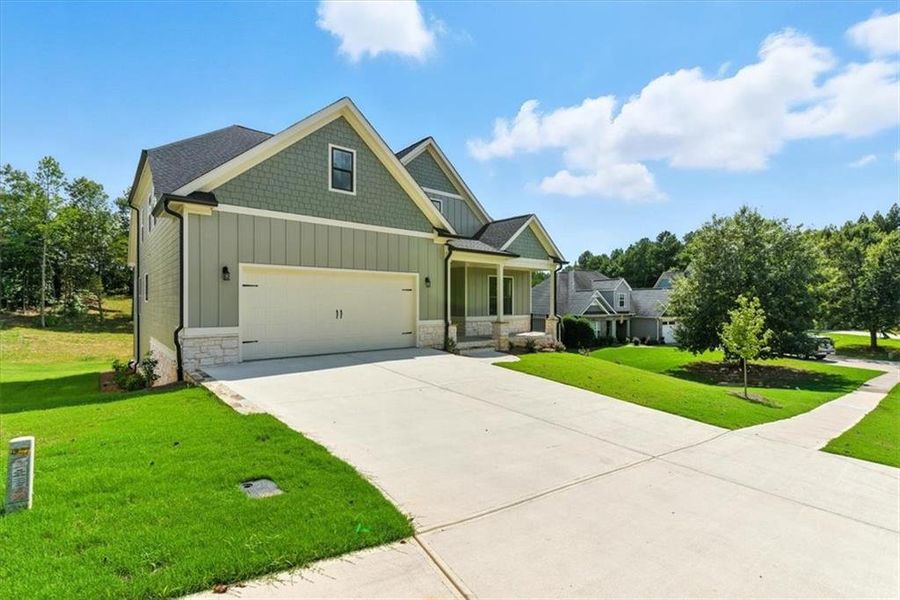 Front exterior of a new home in , Rome, GA, highlighting curb appeal (Image 21). Front exterior of a new home in , Rome, GA, highlighting curb appeal (Image 21).