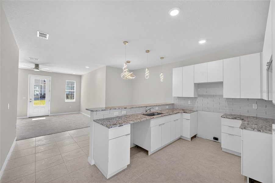Furnished interior view inside a new home in , Davenport (Image 8).