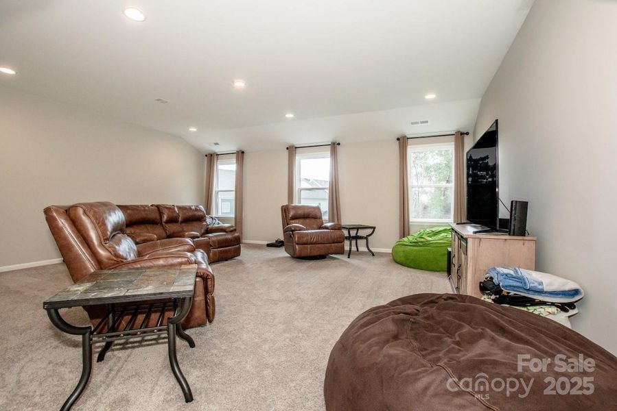 Furnished interior view inside a new home in Signature at Reid's Cove, Mooresville (Image 10).