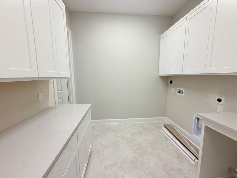 Lots of storage in this Laundry room!