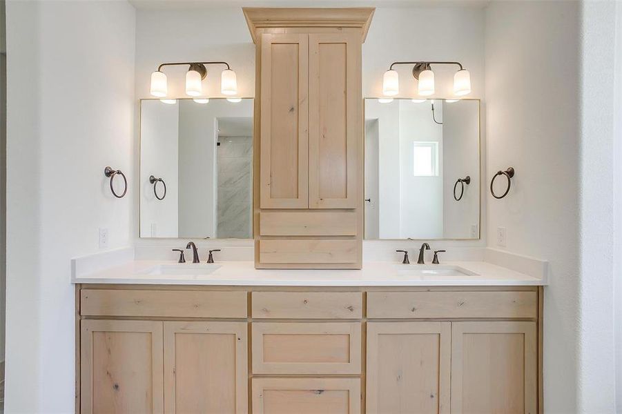 Full bathroom with a sink and double vanity