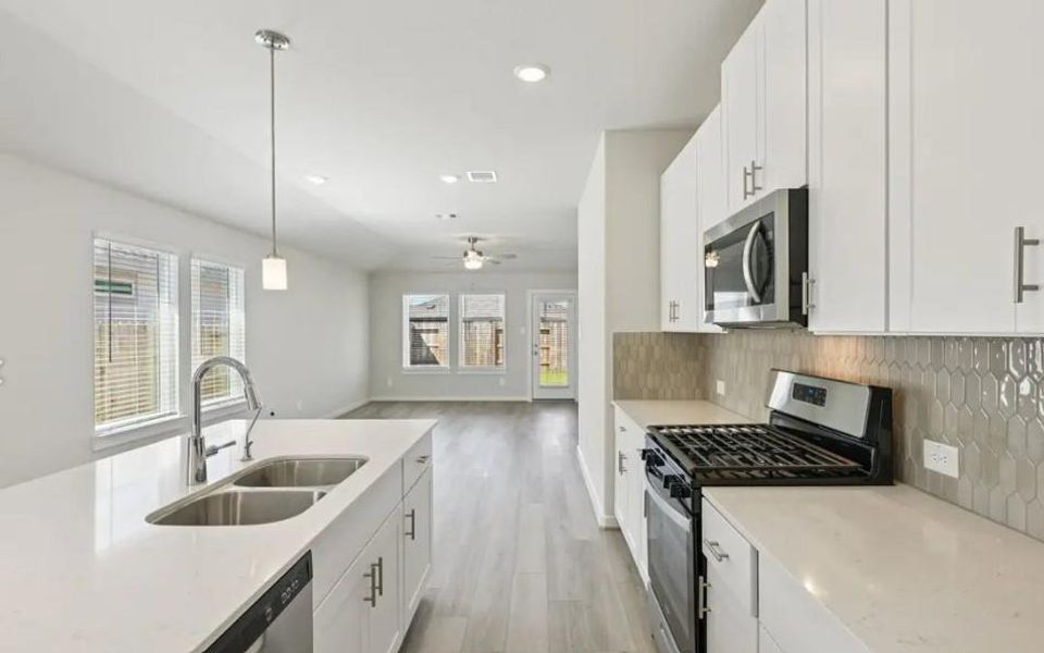 Photo is not of the actual home, but is an inspirational photo of builder’s model home and may depict options, furnishings, and/or decorator features that are not included