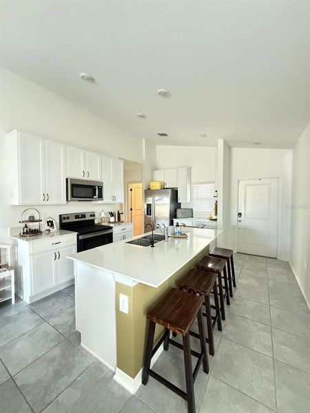 Furnished interior view inside a new home in , Kissimmee (Image 9).