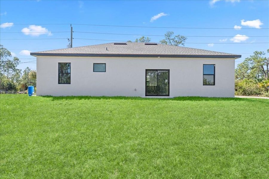 Exterior details and patio area of a home in , Lehigh Acres (Image 15).