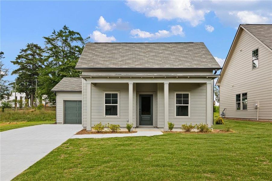Front exterior of a new home in , Carrollton, GA, highlighting curb appeal (Image 18).