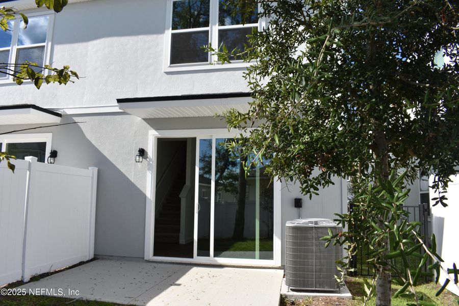 Exterior details and patio area of a home in Irongate Villas, Jacksonville (Image 3).