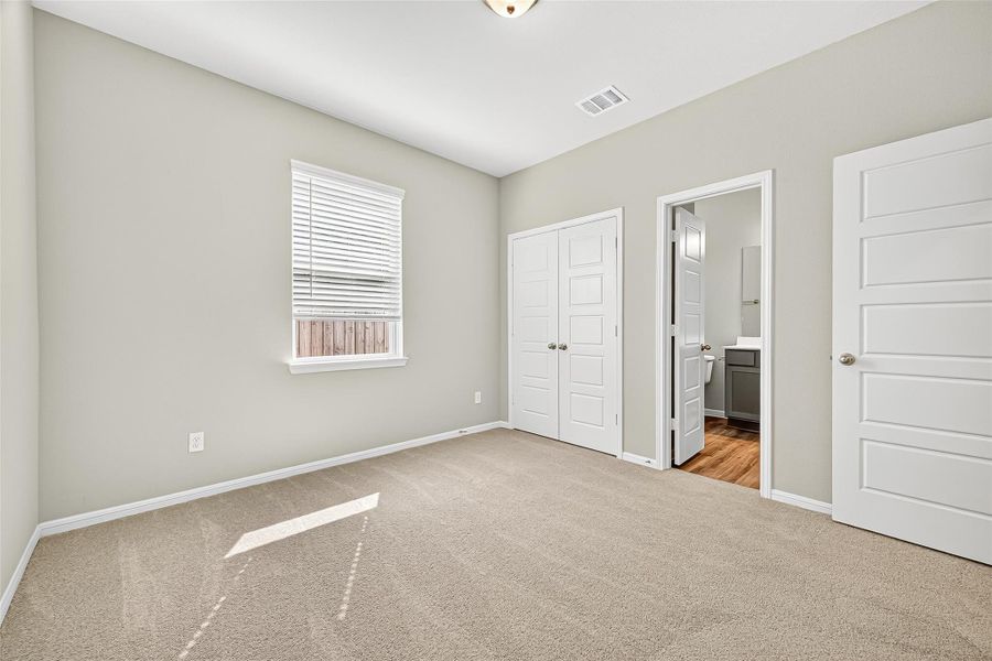 Spacious, unfurnished interior of a new home in Sunterra, Katy (Image 21).